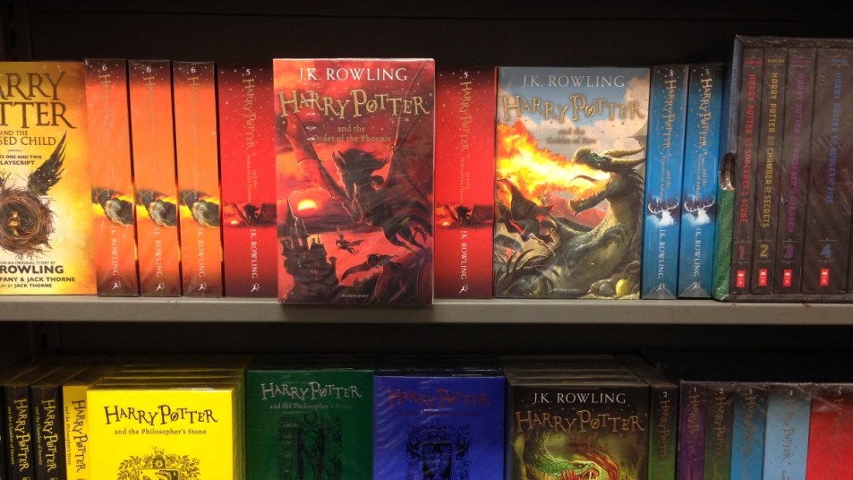 Harry Potter books on a bookshelf
