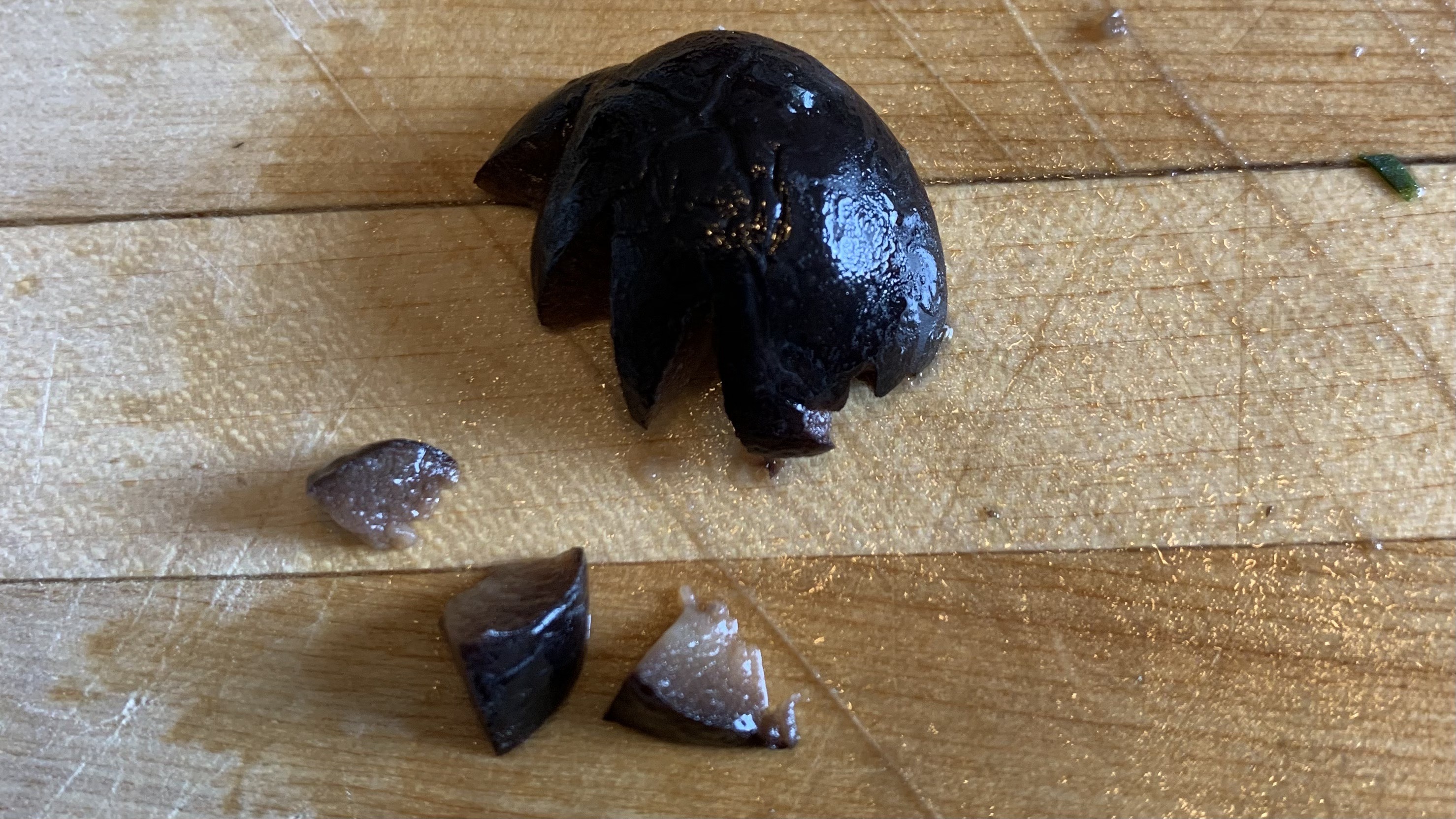 olive sliced into a bat wing