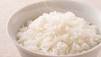 A steaming bowl of white rice