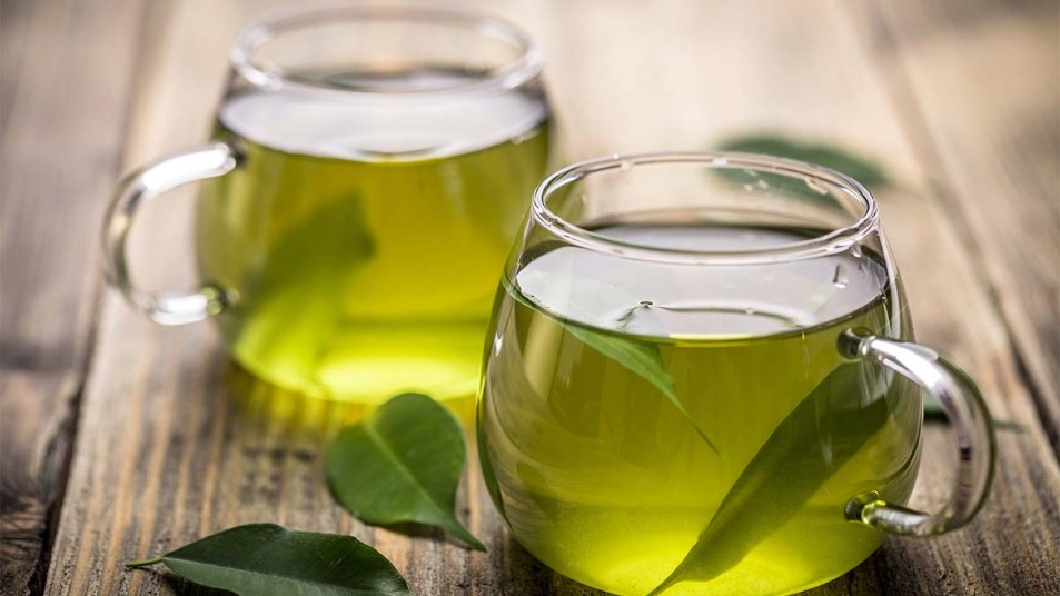 Green tea with tea leaves