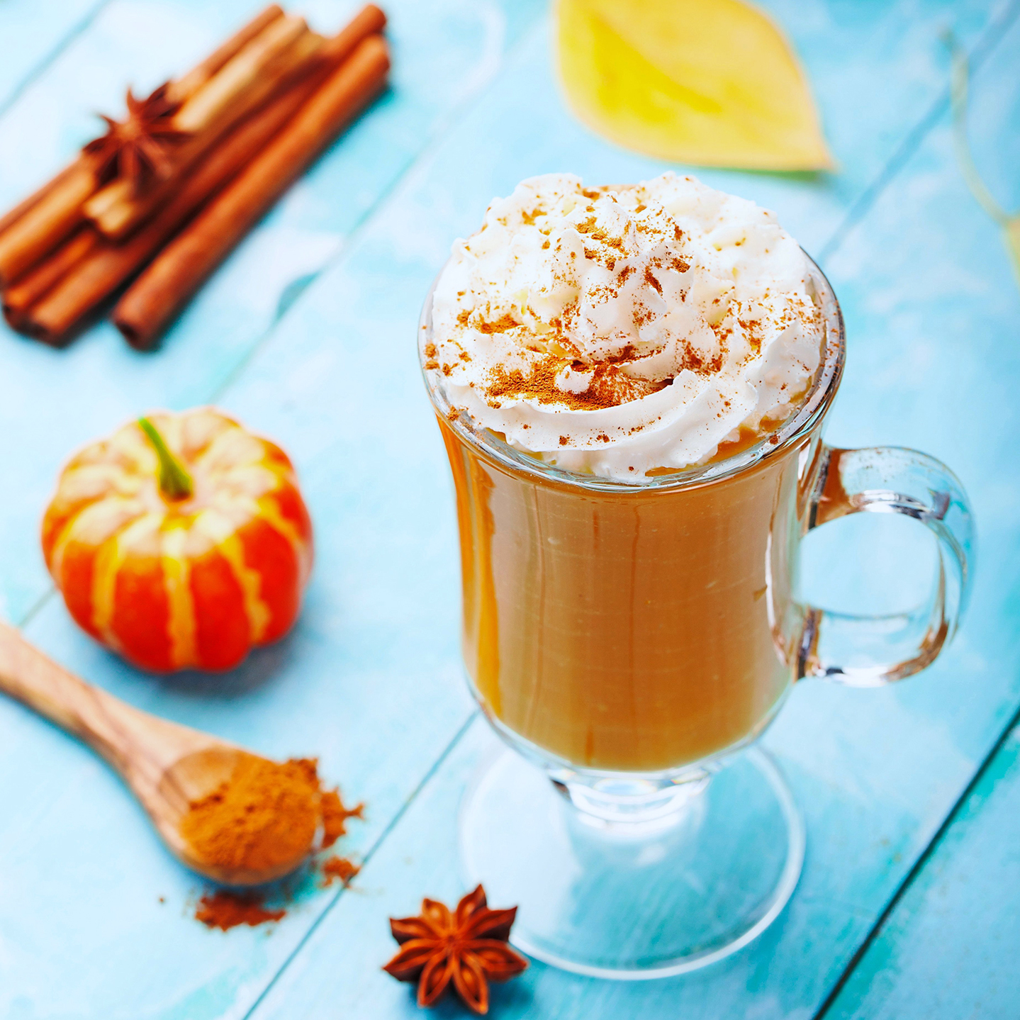 pumpkin cinnamon spiced latte in glass mug