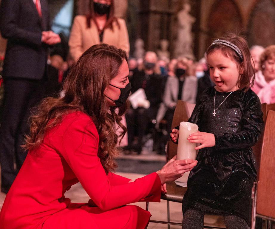 Kate Speaking With a Little Girl at the Event