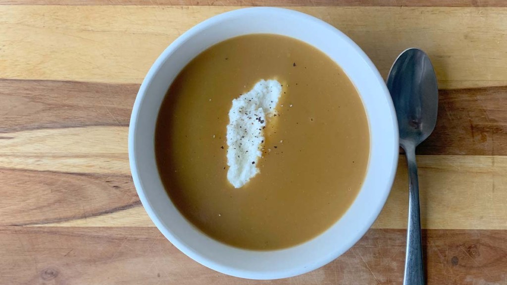 Pumpkin soup with a dollop of ricotta on top