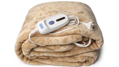 heated blanket in sand color with white cord
