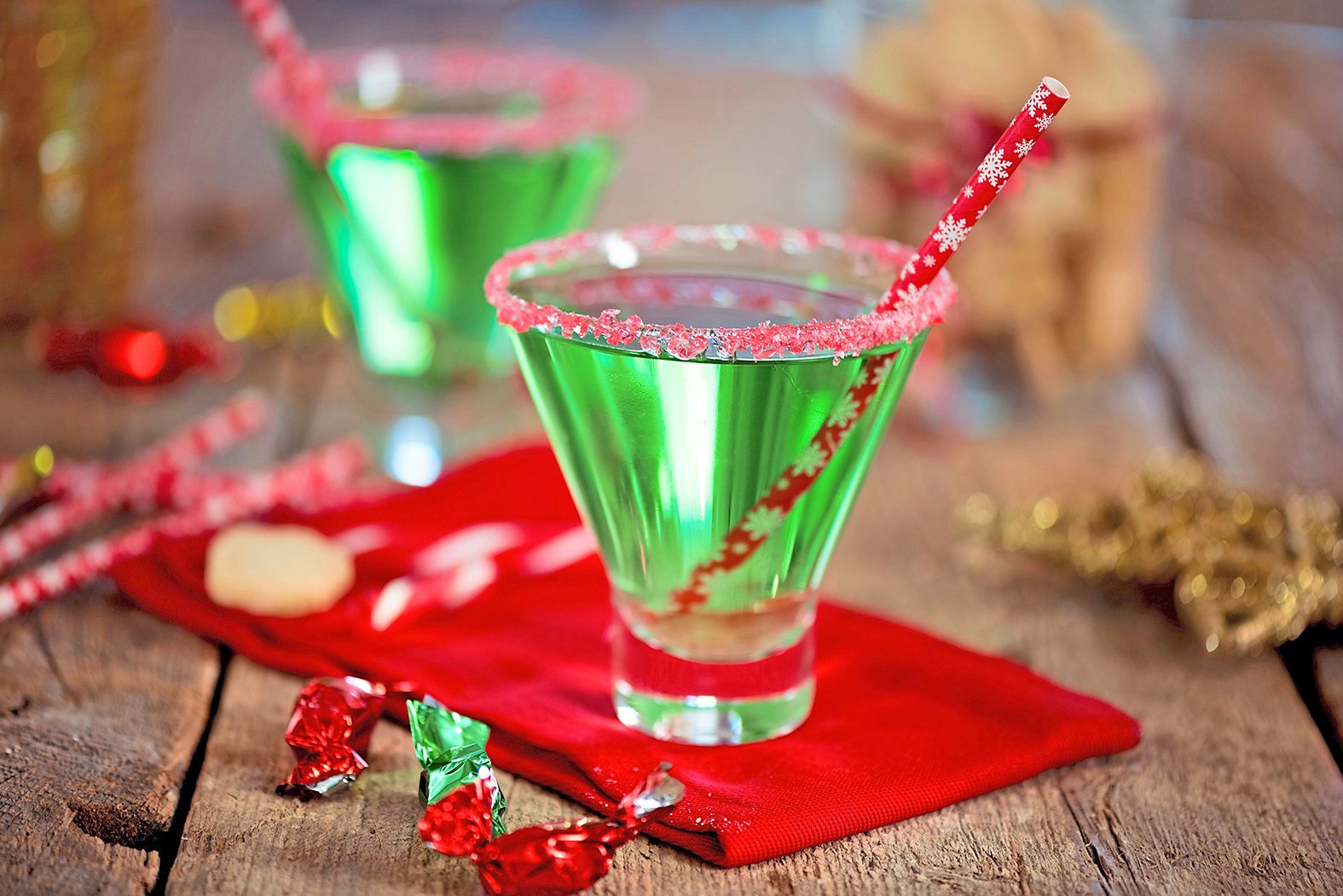 Two Christmas Peppermint-ini peppermint cocktails on table