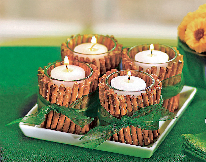 Candles decorated with pretzel sticks