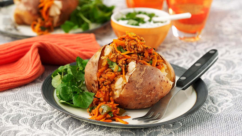 Chili stuffed baked potato as part of a guide on how to reheat a baked potato