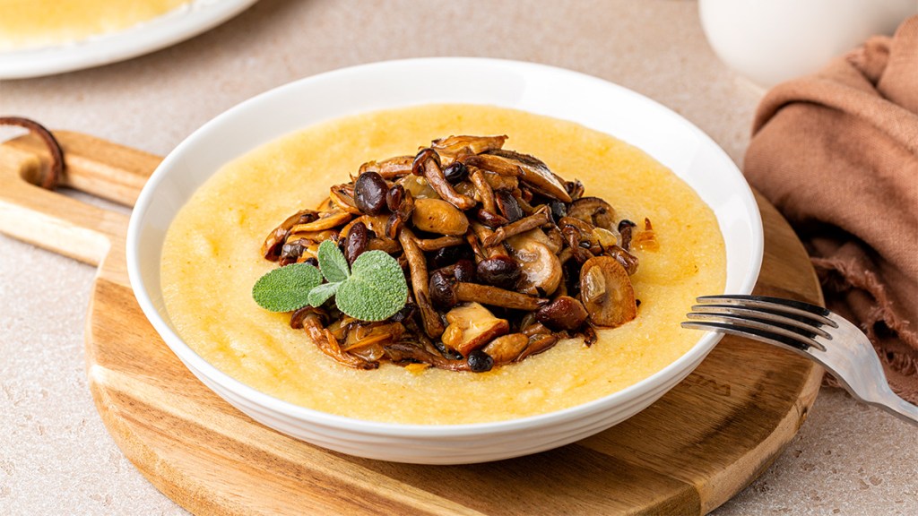 Creamy polenta topped with a quick version of homemade caramelized onions
