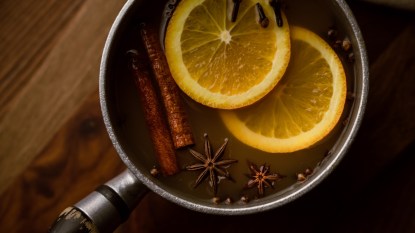 simmer pot full of orange cinnamon and spices