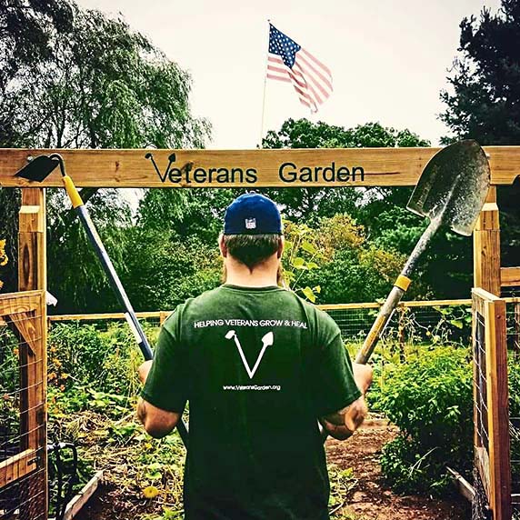 Man in Veterans Garden T-Shirt