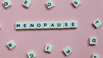 Scrabble blocks spelling out the word "menopause"