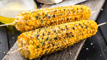 Two ears of grilled corn