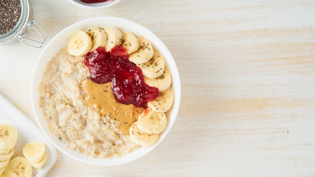 oatmeal with strawberry jam peanut butter banana and chia seeds
