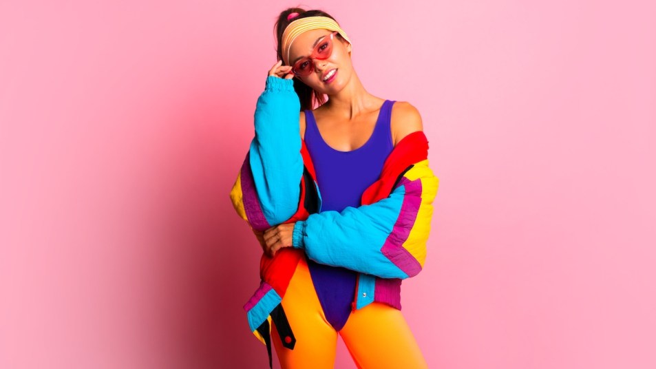 Woman dressed in 1980s-style outfit