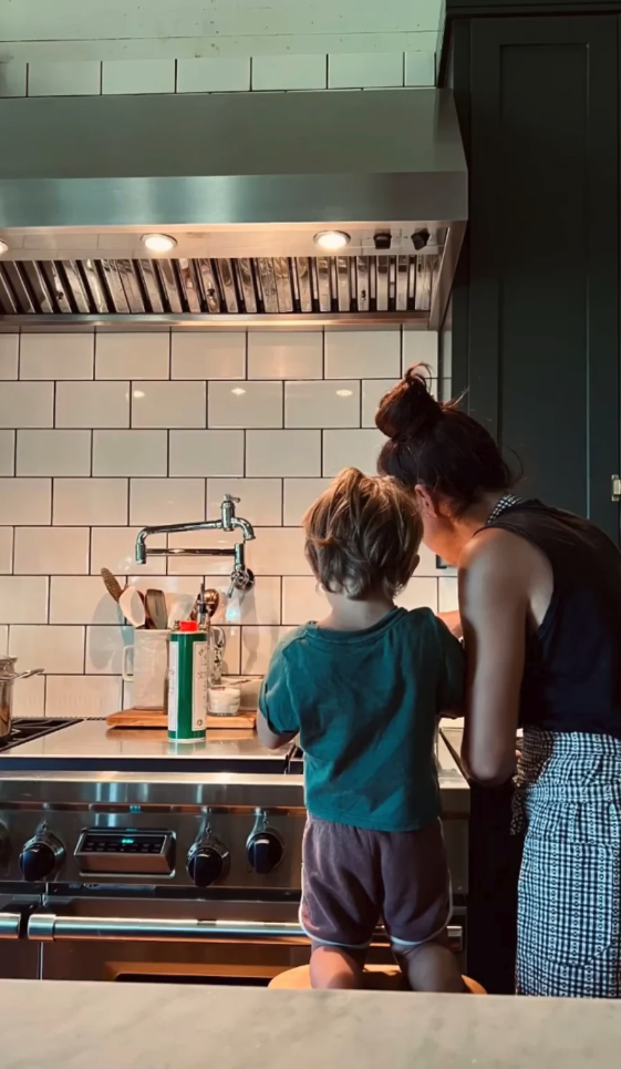 Joanna Gaines cooking with child
