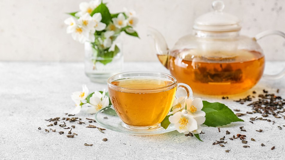 cup and pitcher of jasmine tea