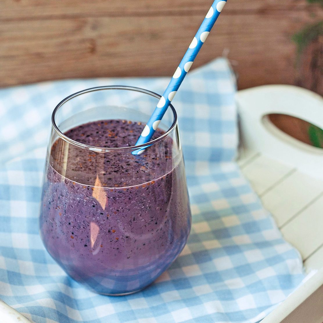 charcoal blueberry smoothie on gingham napkin
