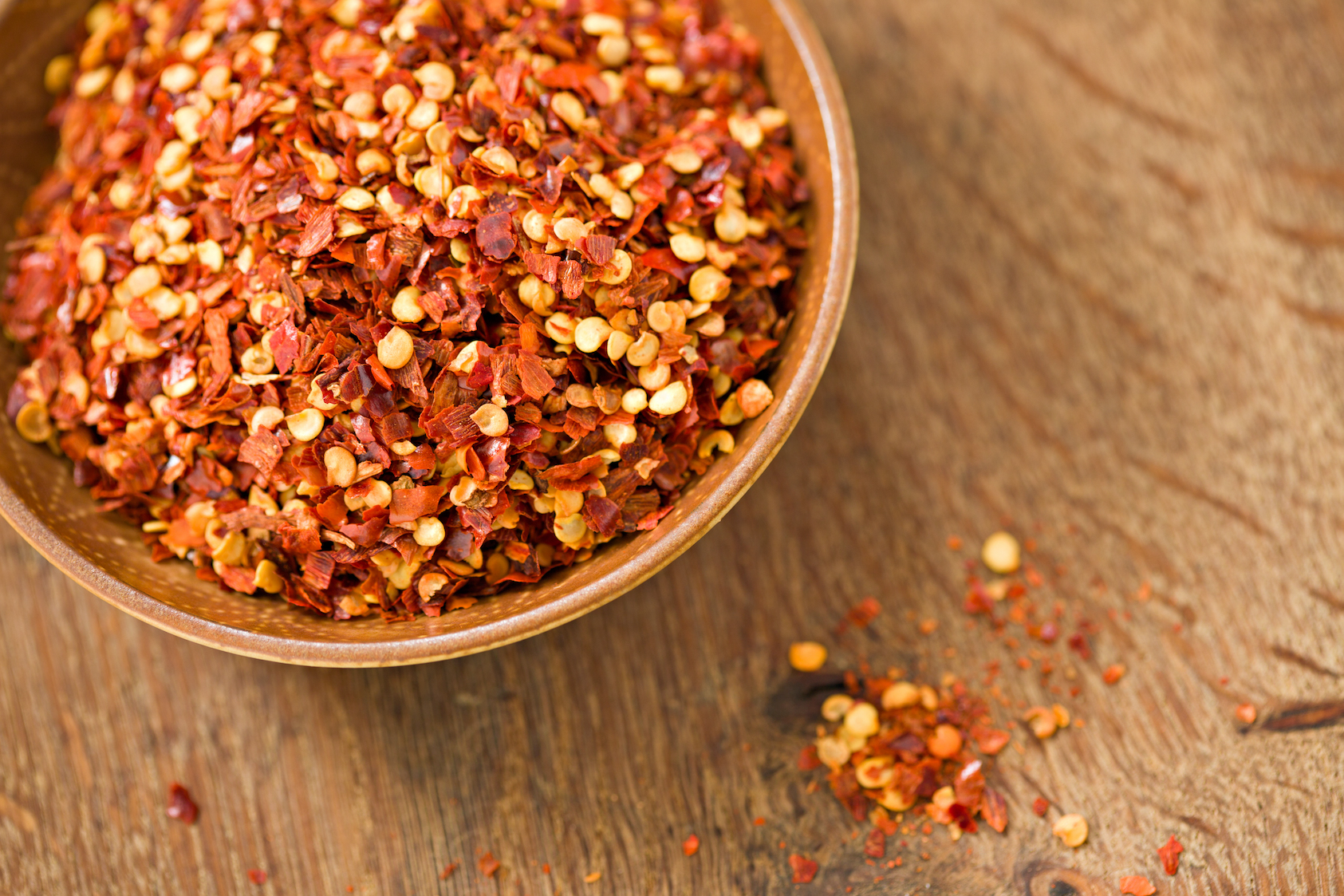 hot pepper flakes to keep squirrels from bird feeders