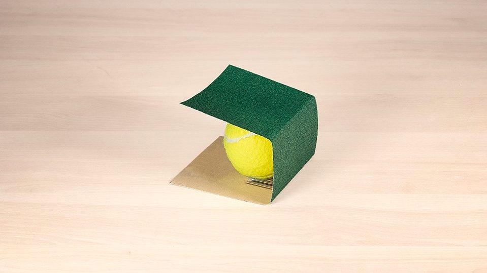 Tennis balls help sand curved wood