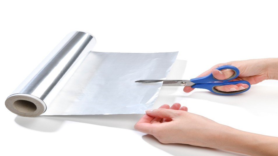 Scissors cutting foil