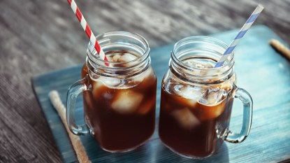 iced coffee vs. cold brew in mason jars on table