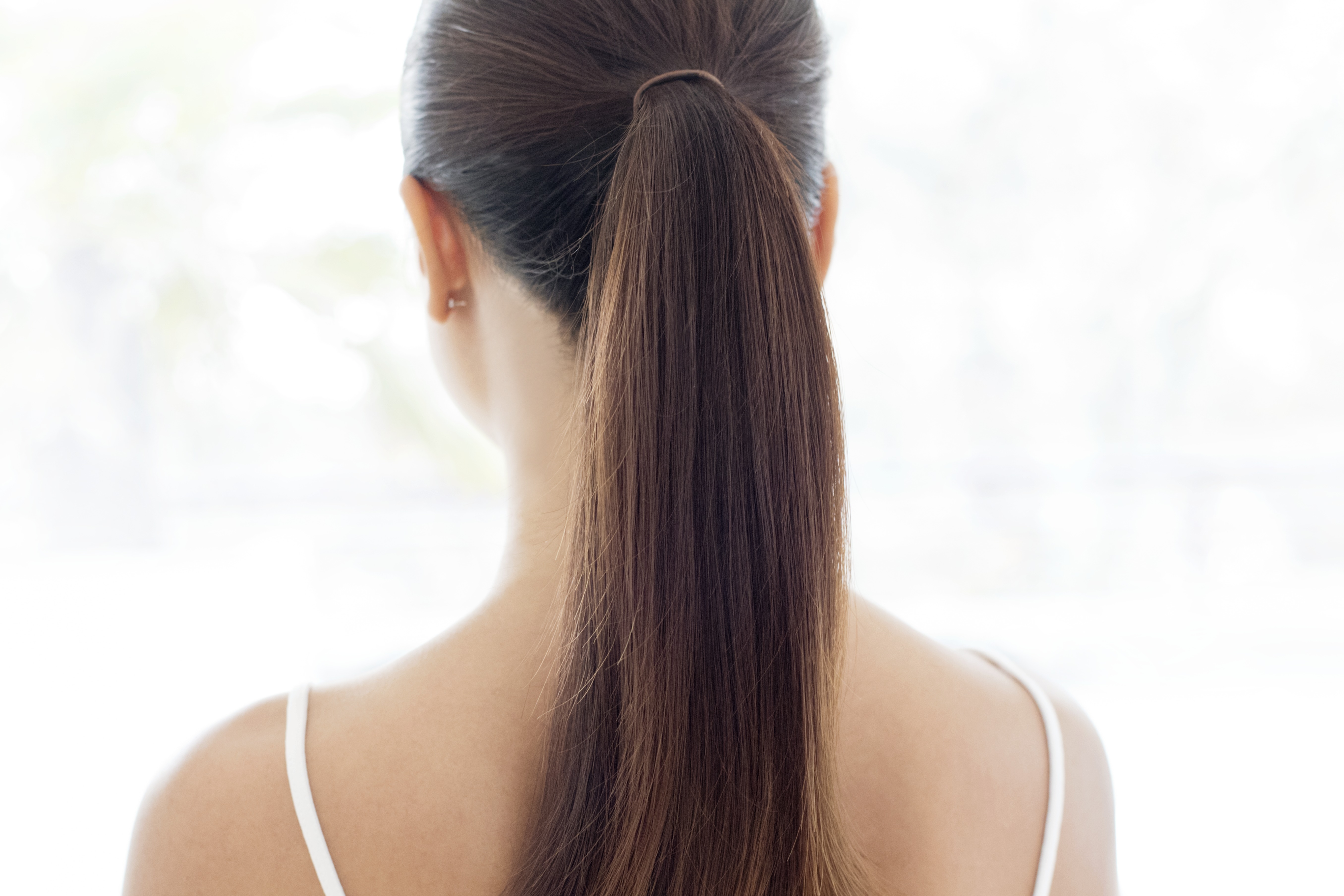 Woman with a thick ponytail