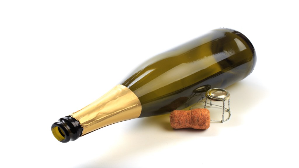 empty bottle of wine isolated on a white background (How to Remove a Cork Without a Corkscrew)