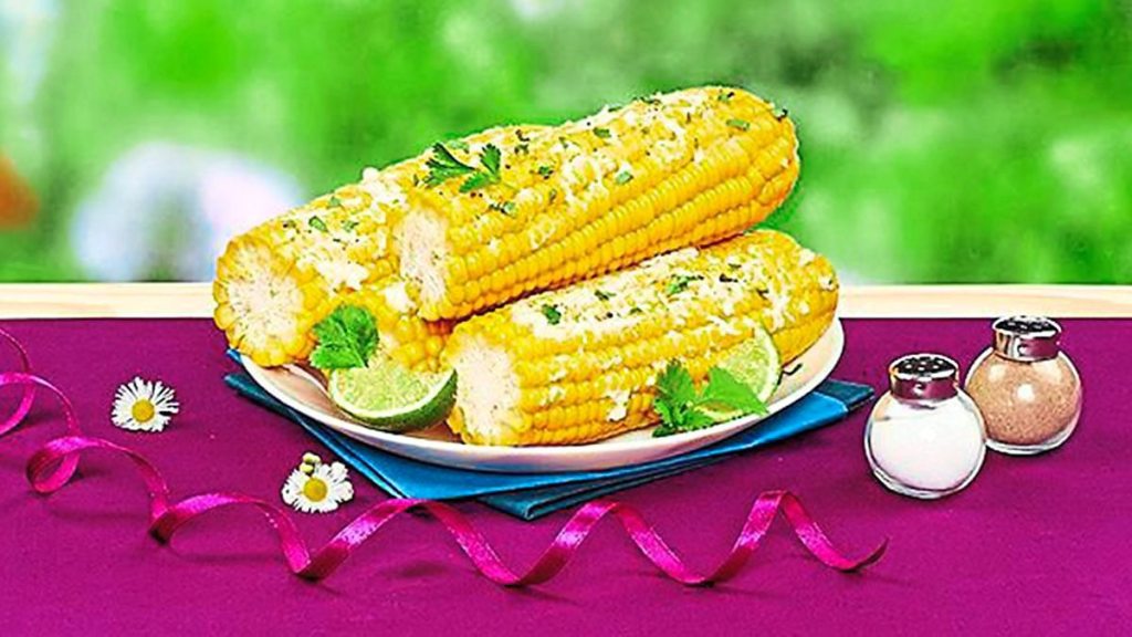 Cilantro-Lime Corn sits on a plate waiting to be eaten