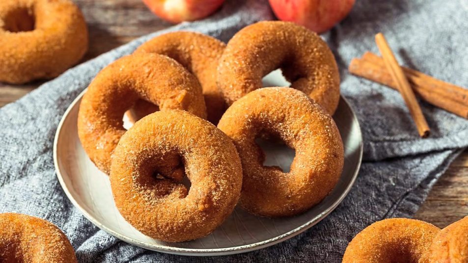 A plate of Apple Cider Donuts sits waiting to be eaten