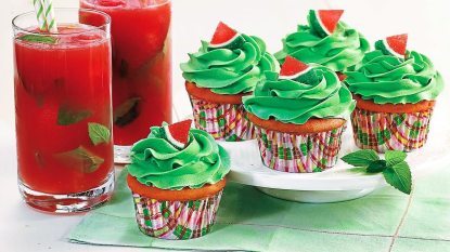 Watermelon Mojito Cupcakes sits next to a red mojito (cocktail cupcakes)