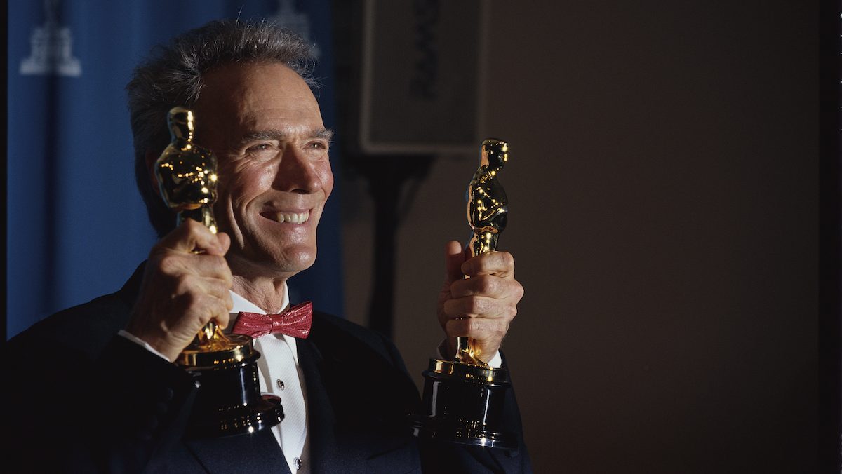 Clint Eastwood holding his Oscars for Best Picture and Best Director, 1992 