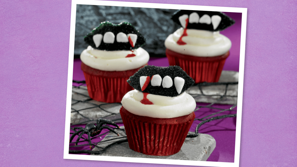 Vampire cupcakes sit on a plate- scary cupcakes