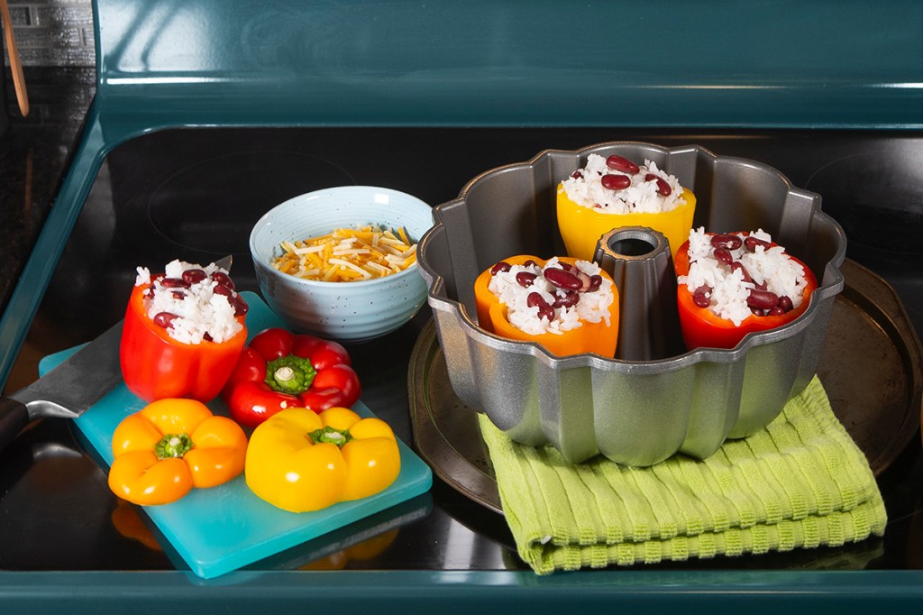Bundt pan being used to make stuffed peppers