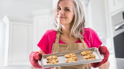 How to sell baked goods from Home: Portrait of Caucasian woman holding baked cookies