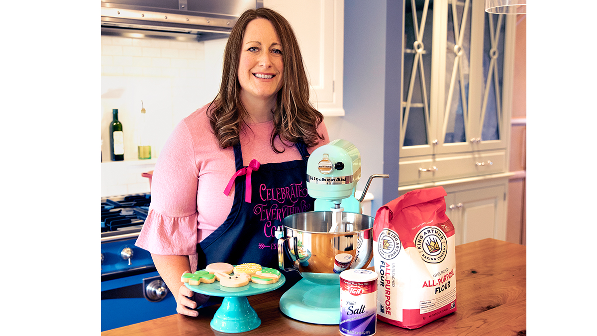 Megan Spahic in her her kitchen with cookies and supplies, How to Sell Baked Goods From Home