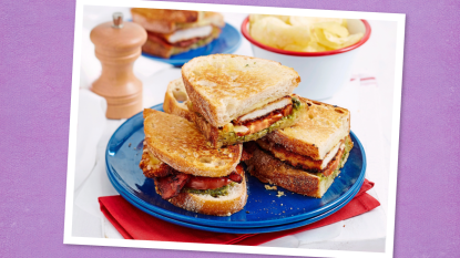 Chicken Cutlet Paninis sits on a purple background (Monday night dinner ideas )