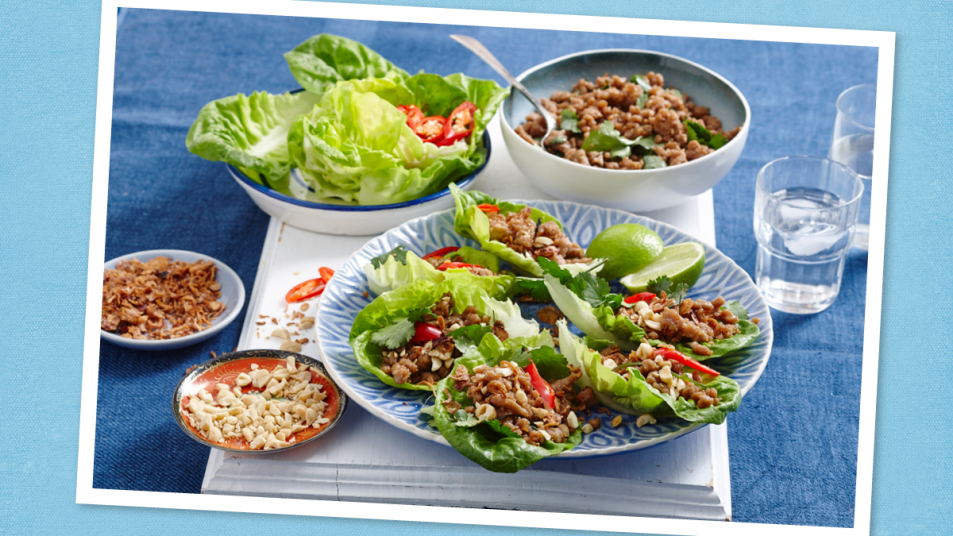 Asian Turkey-Filled Lettuce Cups sits on a blue background (Monday night dinner ideas )