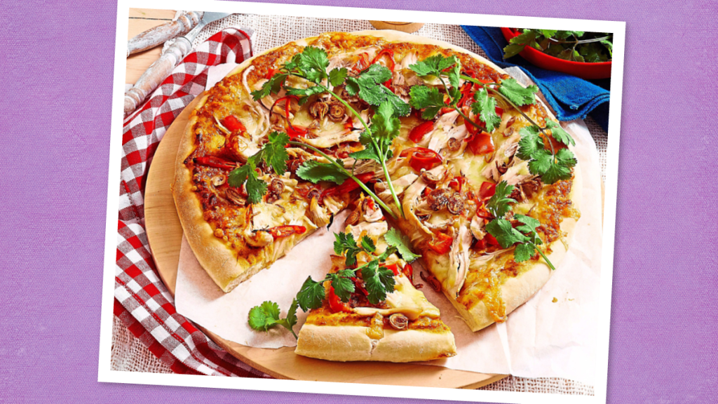 Tex-Mex Chicken Pizza sits on a purple background (Thin Sliced Chicken Breast Recipes)