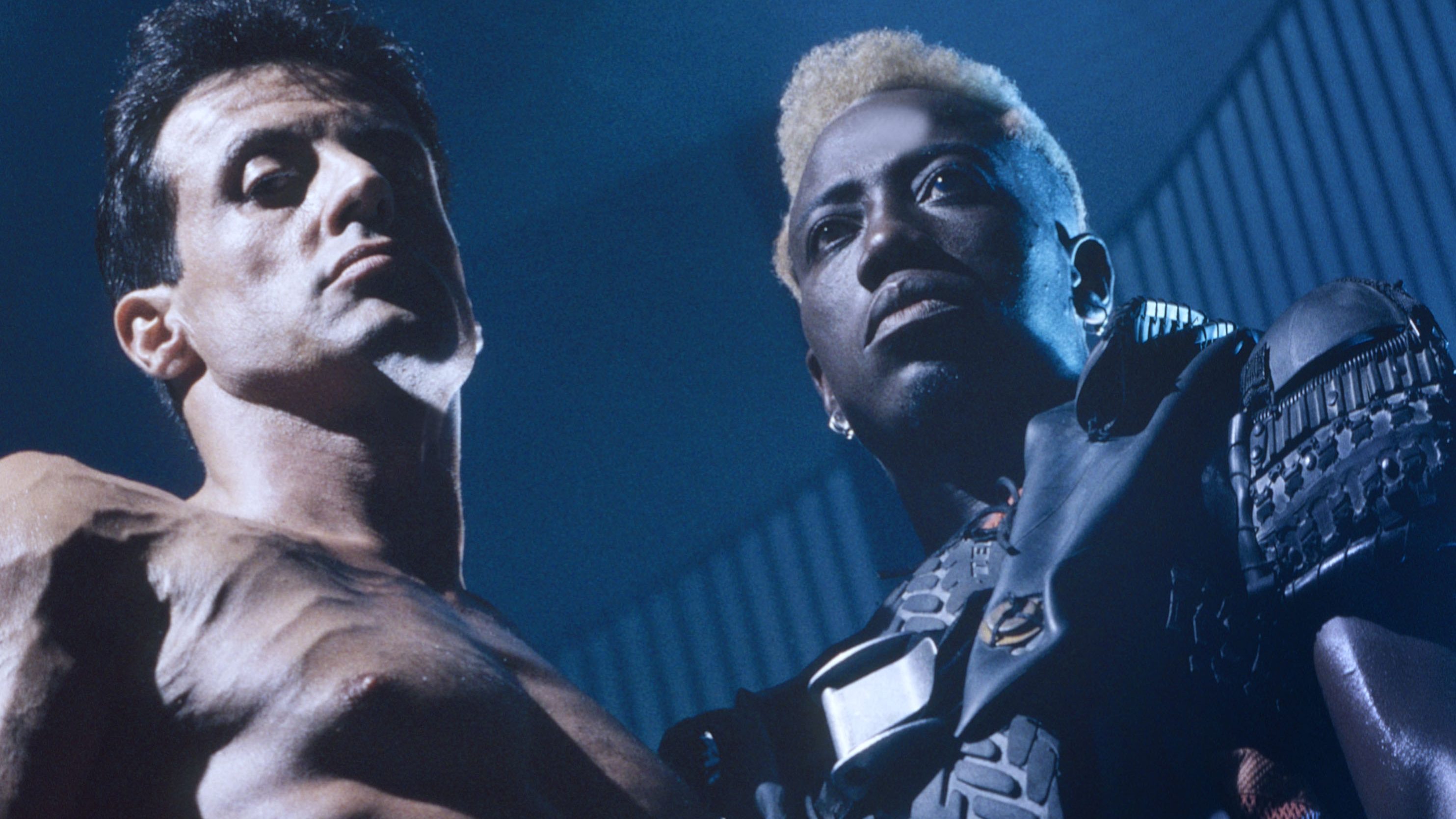 Los Angeles - CIRCA 1993:  Actors Sylvester Stallone and Wesley Snipes stars of the movie Demolition Man pose for a portrait circa 1993 in Los Angeles, California  (Photo by Aaron Rapoport/Corbis/Getty Images)