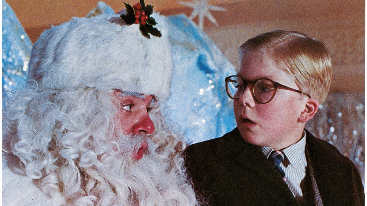 Ralphie sits on Santa's lap in a scene from A Christmas Story, 1983