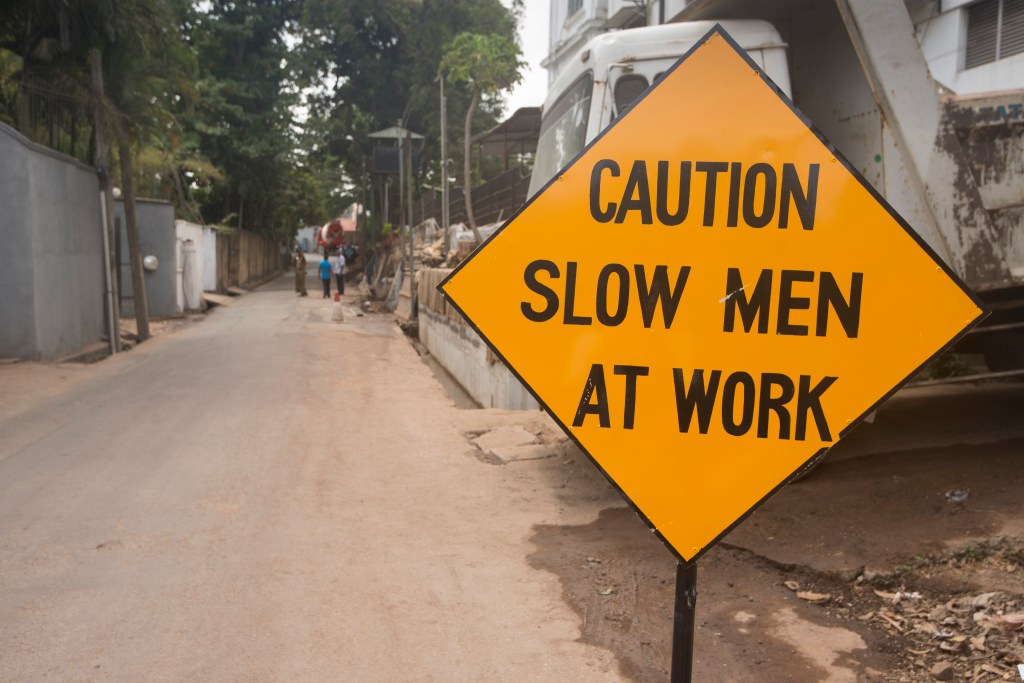 Funny signs: Caution, slow men at work