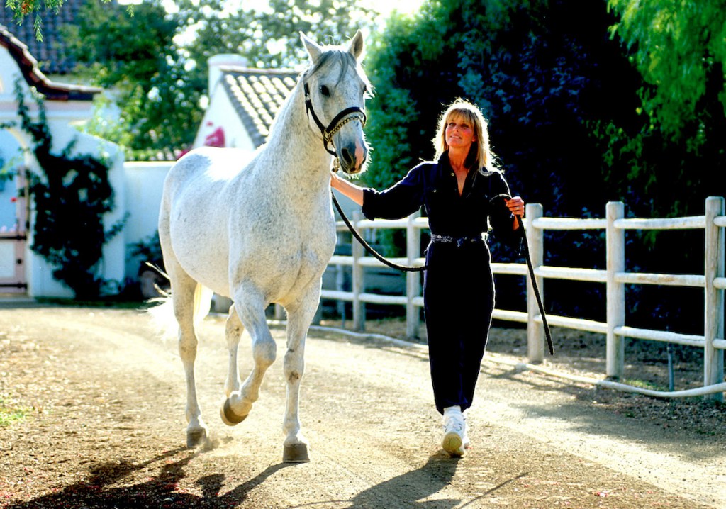Bo Derek with her horse in 1990