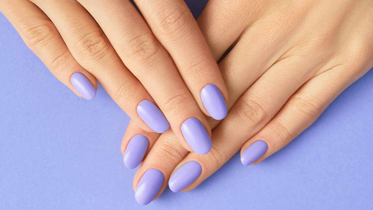pretty hands with purple at home gel nails