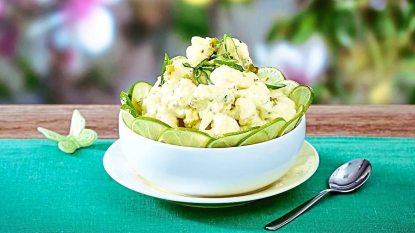 Curry-Lime Cauliflower Salad sits in a bowl (Side dishes for meatloaf)