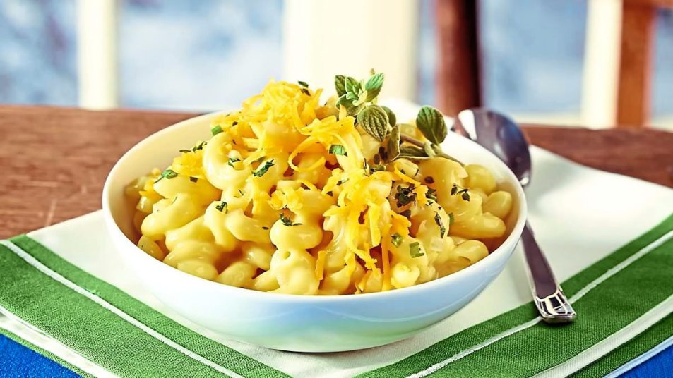Cheddar-Parmesan Mac ‘n’ Cheese sits on a plate (Side dishes for meatloaf)