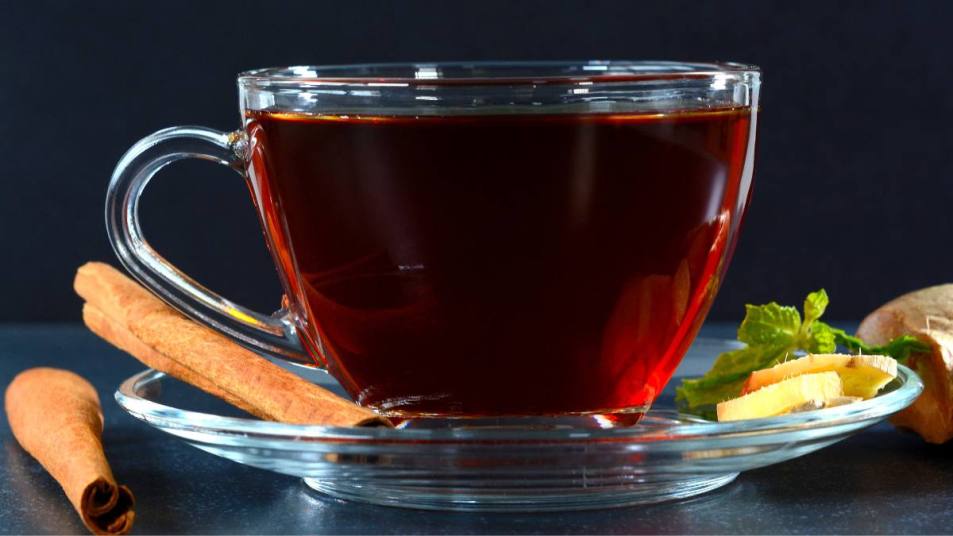 Cinnamon Tea Benefits Lead Photo: Cinnamon ginger tea with cinnamon sticks