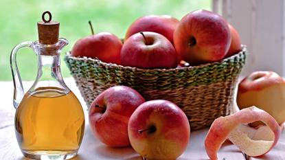 Uses for apple cider vinegar: Bottle of organic apple vinegar