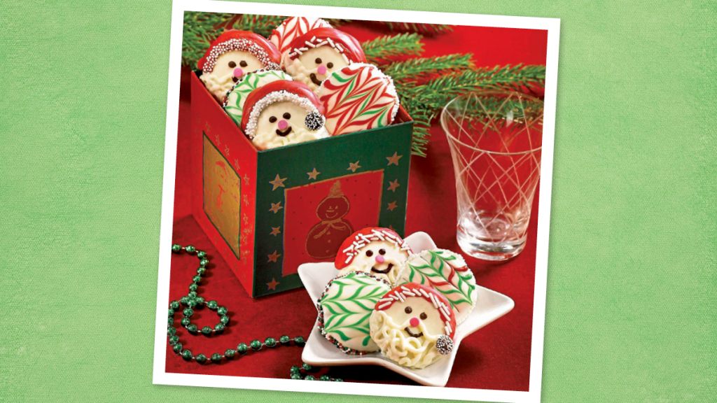 Chocolate-covered Oreo cookies decorated to look like Santa