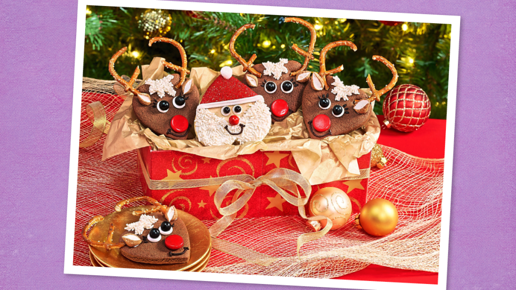 Santa and reindeer cookies in a festive box for Christmas