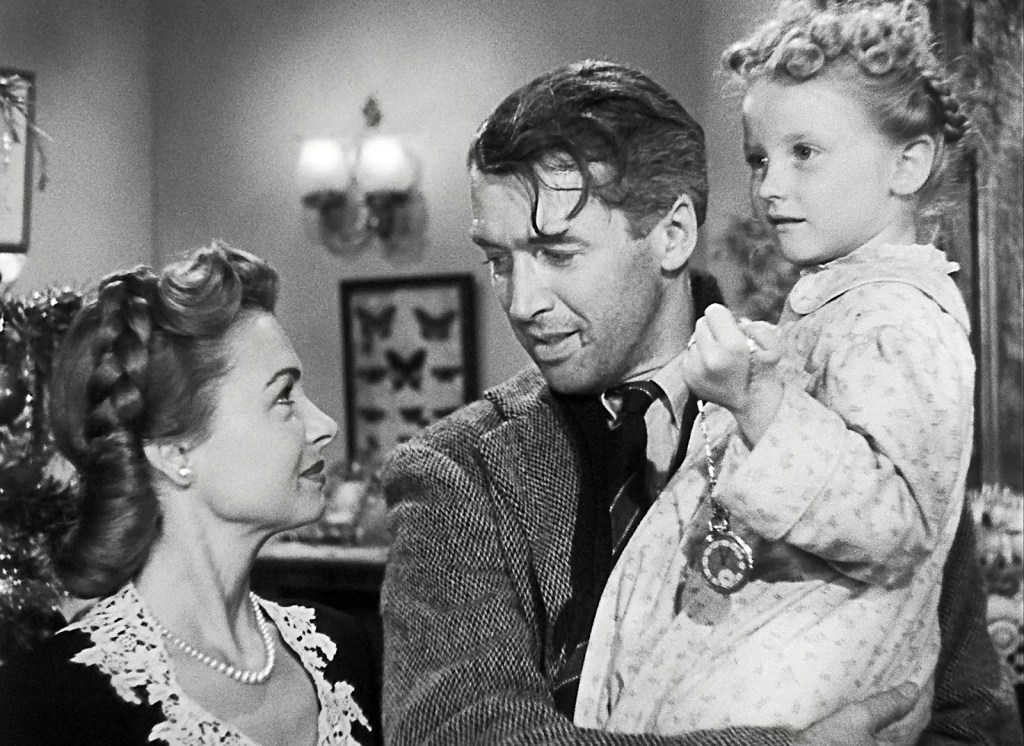 Donna Reed, Jimmy Stewart and Karolyn Grimes It's a Wonderful Life